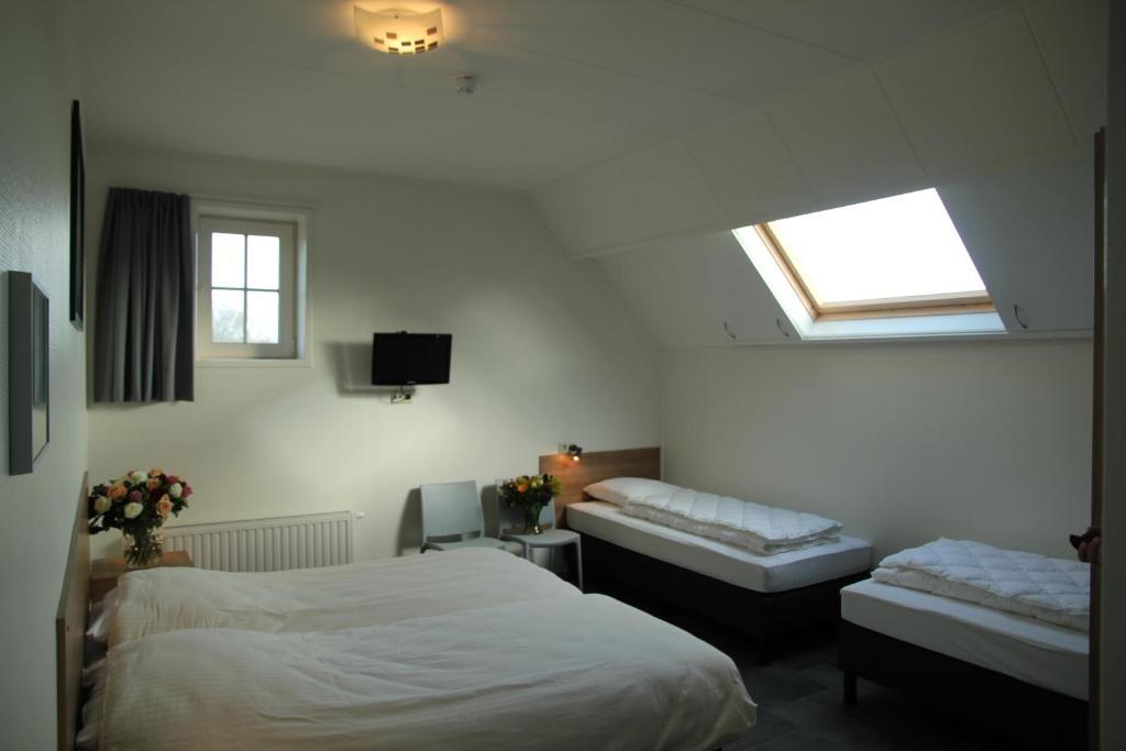 Duinoord Oostkapelle Bed and Breakfast Værelse billede